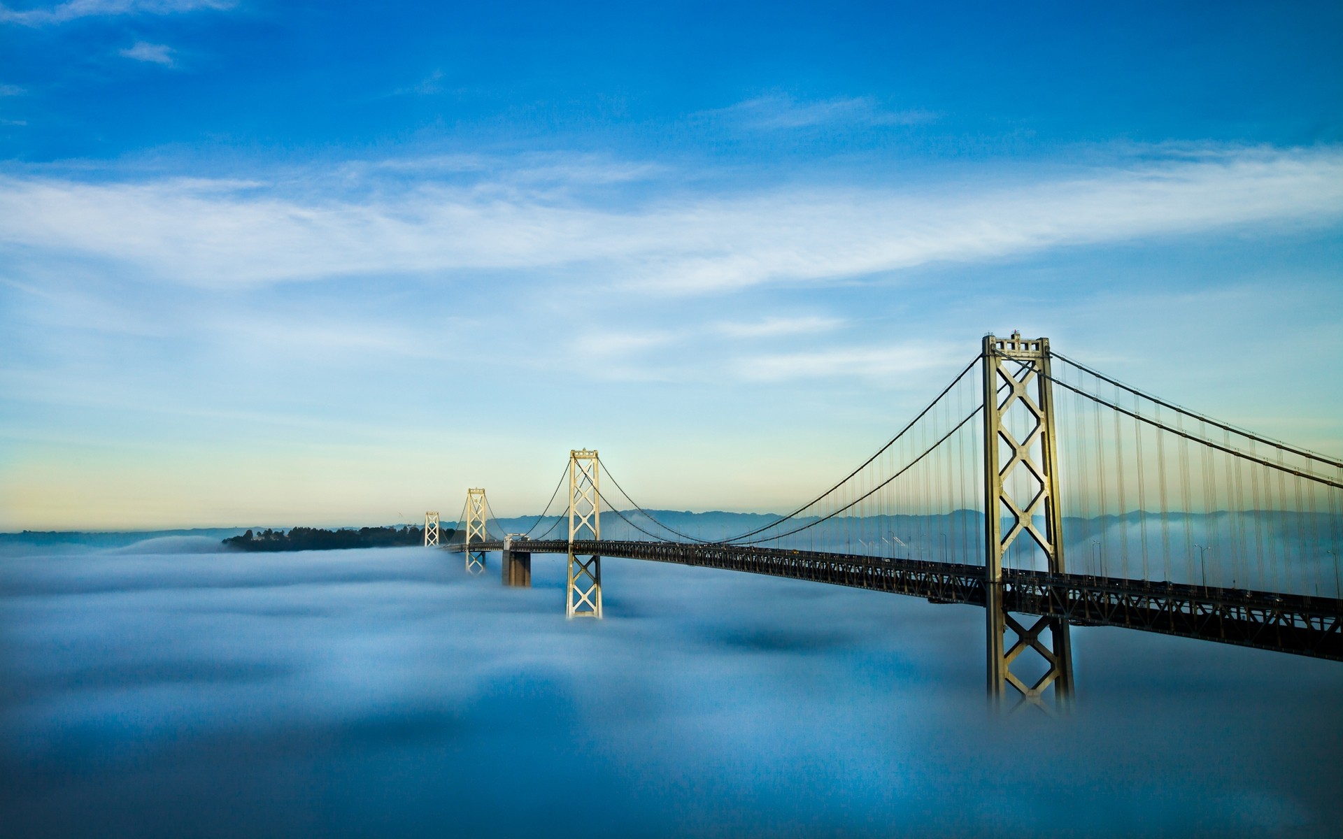 Фото кроме на обои. Мост между Сан-Франциско и Оклендом. Подвесной мост Bay Bridge, США. Мост Бэй-бридж 1906. Америка Сан Франциско Окленд.